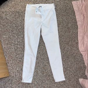 size 10 white american eagle skinny jeans